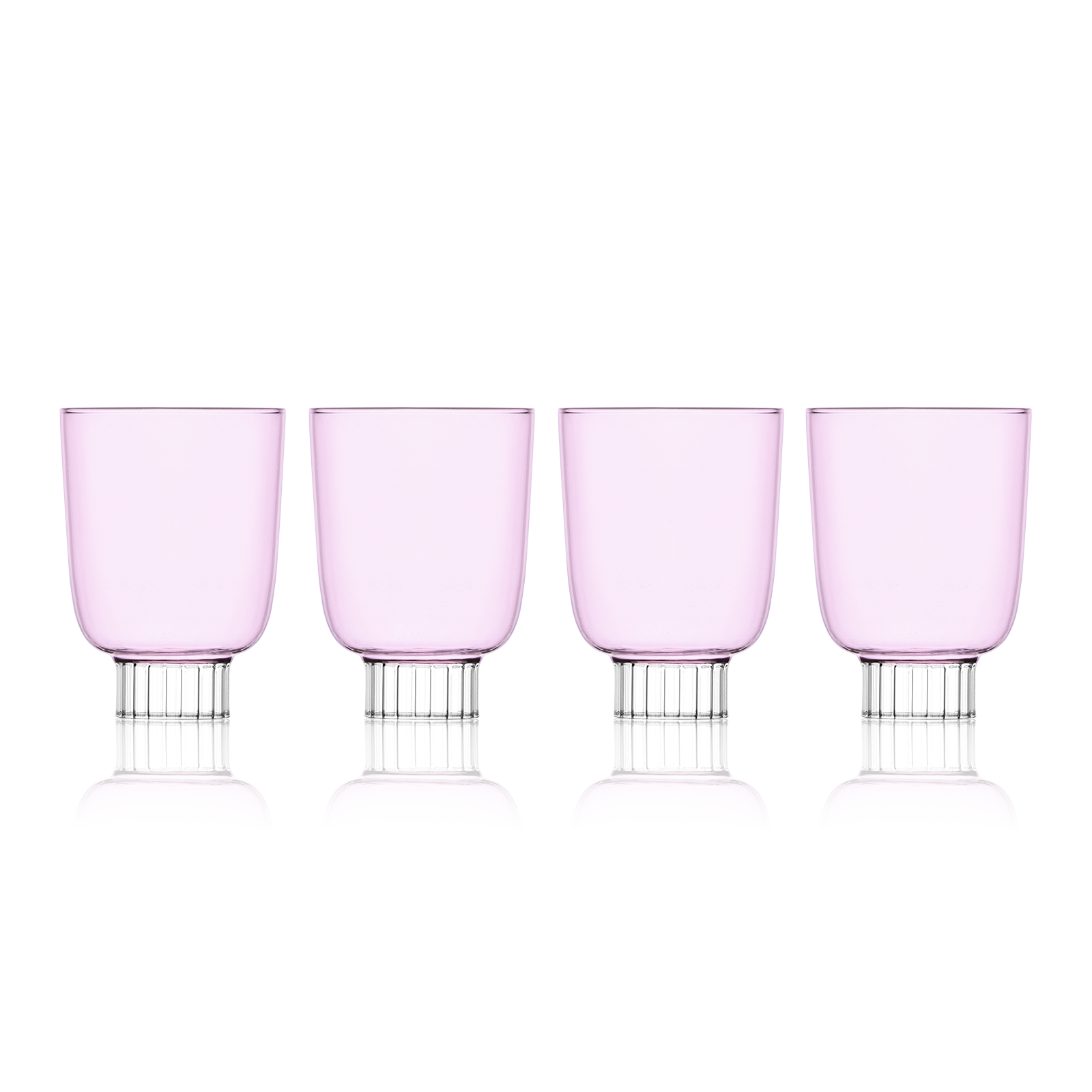 Set-of-four blush pink colored winery glasses. Sprezz's colored stemware and safe glassware are handmade and dishwasher safe, making them the perfect unique touch to any effortless dinner party.