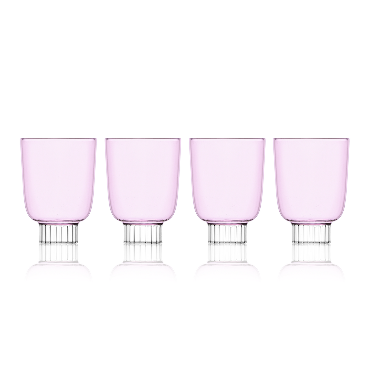 Set-of-four blush pink colored winery glasses. Sprezz's colored stemware and safe glassware are handmade and dishwasher safe, making them the perfect unique touch to any effortless dinner party.