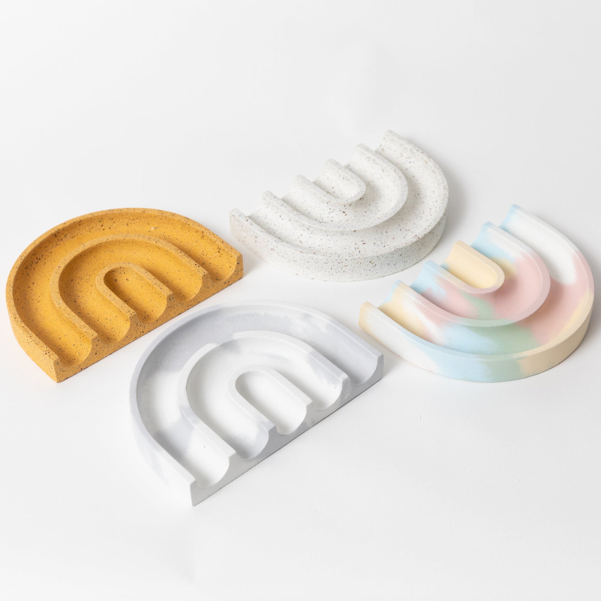 Concrete terrazzo sponge rest in white with sponge.