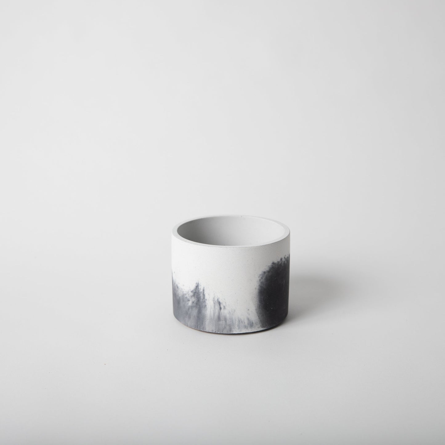 4 inch concrete vessel with cork base in black and white.