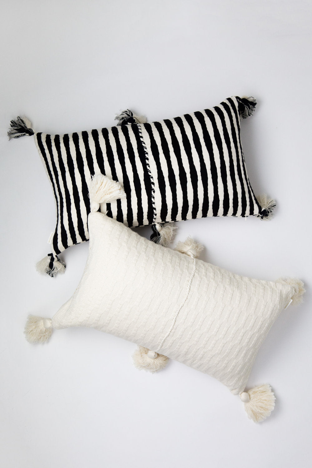 Antigua Pillow - Black and Natural Ivory