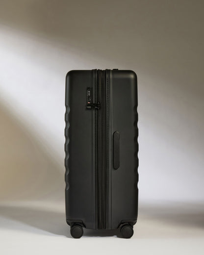 Large Luggage in Black - Icon Stripe