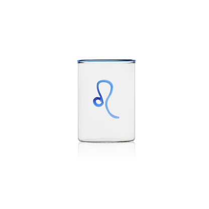 This handblown clear rocks glass with a Leo zodiac sign on the outside in cobalt blue glass brings just the right amount of color to the table. The Ultimate Gift under $50  Crafted of borosilicate glass, which is prized for its durability and resistance to thermal shock, this Zodiac Tumbler has a cobalt blue glass rim to add a cheerful yet elegant touch to any occasion.