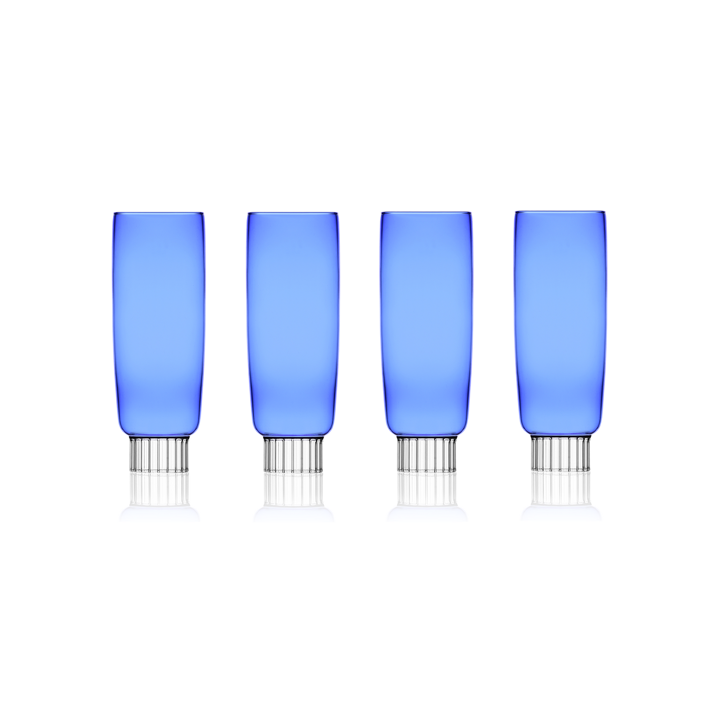 A set of four cobalt blue champagne flutes unique to Sprezz, designed for modern tables, perfect for adding a splash of color to New York chic Easter parties or spring gatherings.