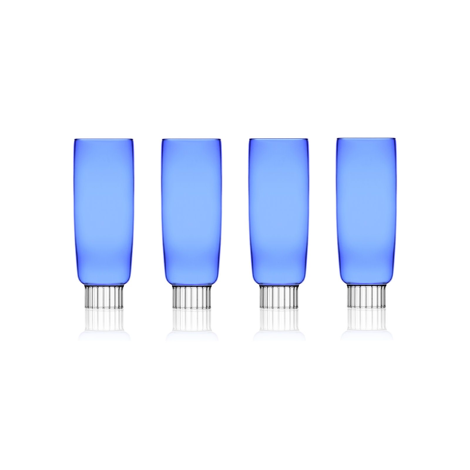 A set of four cobalt blue champagne flutes unique to Sprezz, designed for modern tables, perfect for adding a splash of color to New York chic Easter parties or spring gatherings.