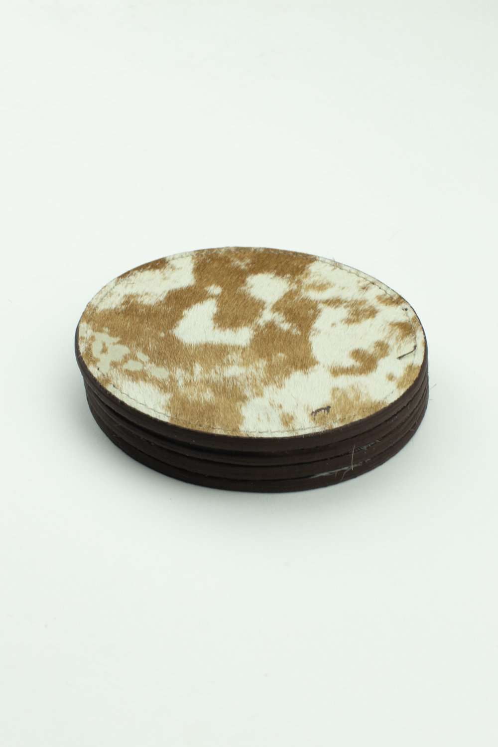 COWHIDE COASTER SET OF 4 - RES IPSA