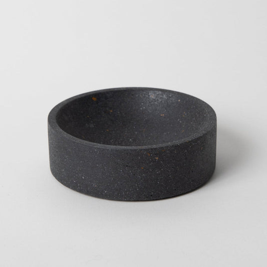 5 inch terrazzo concrete catch all with cork base in black.